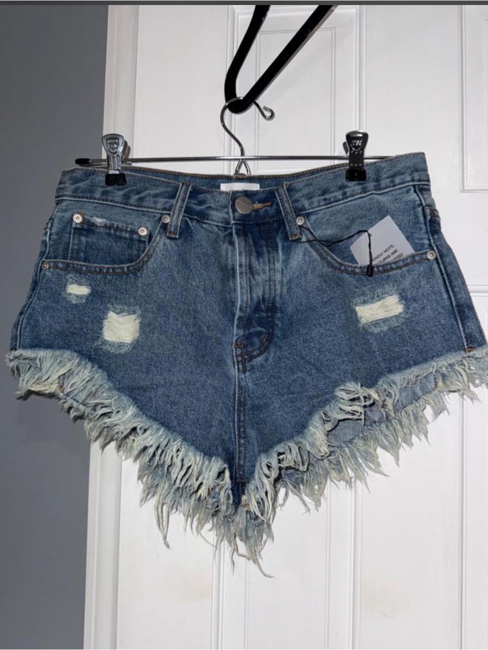 superdown Distressed Fringe Hem Denim Shorts in Blue